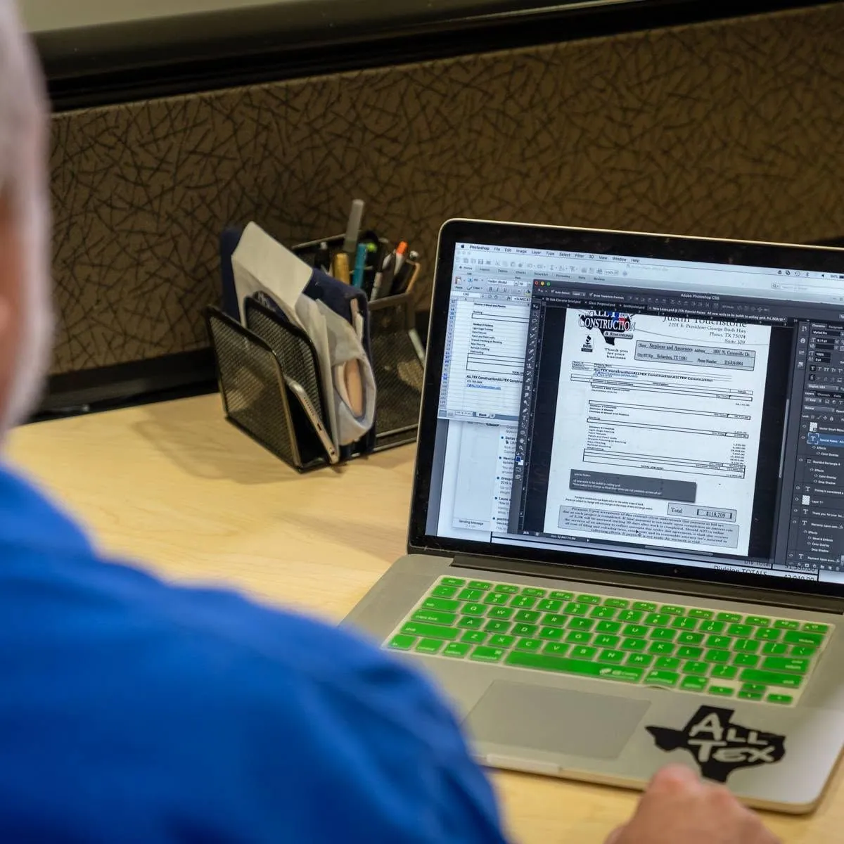 AllTex estimator reviewing a project on a laptop
