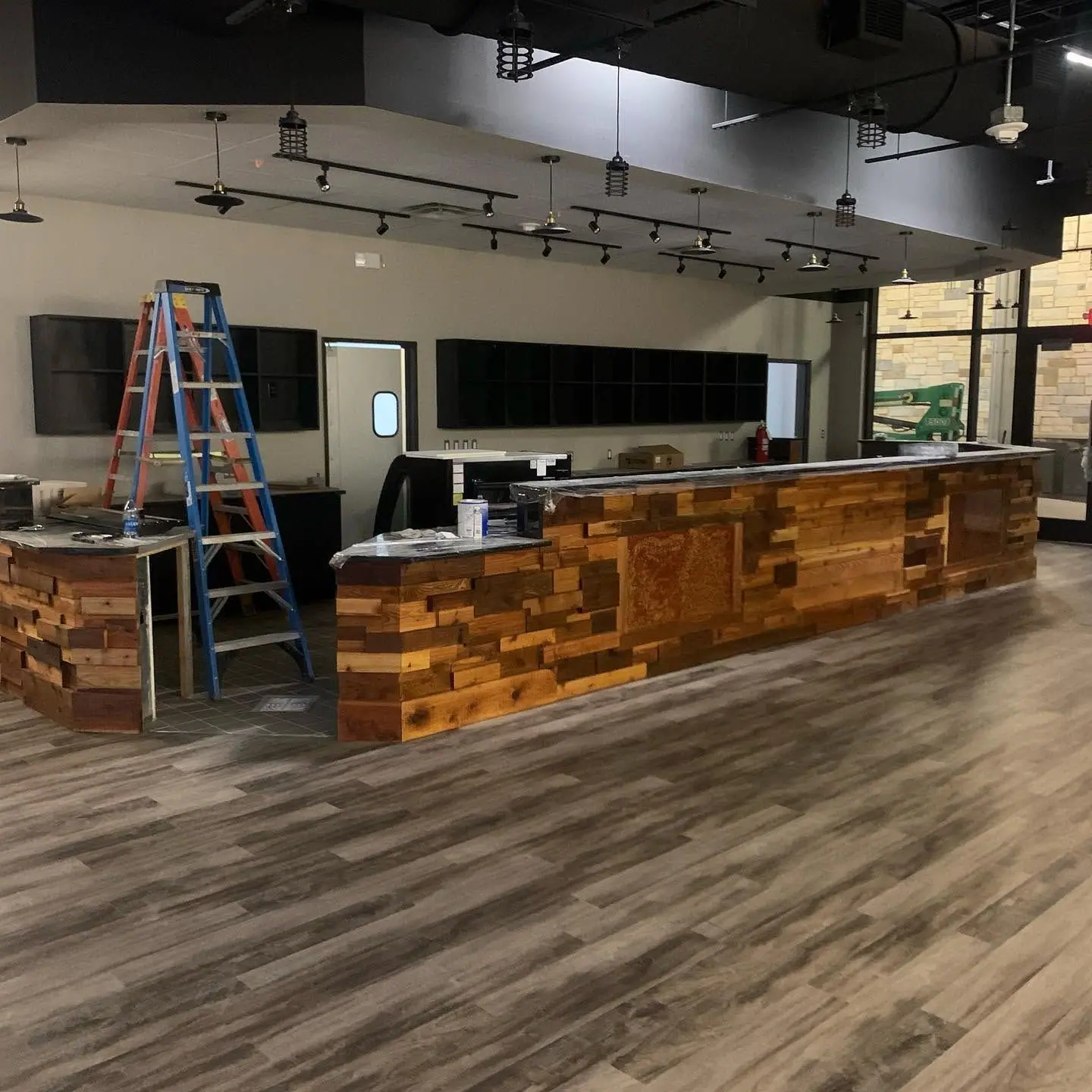 Reclaimed-wood reception desk in an office lobby