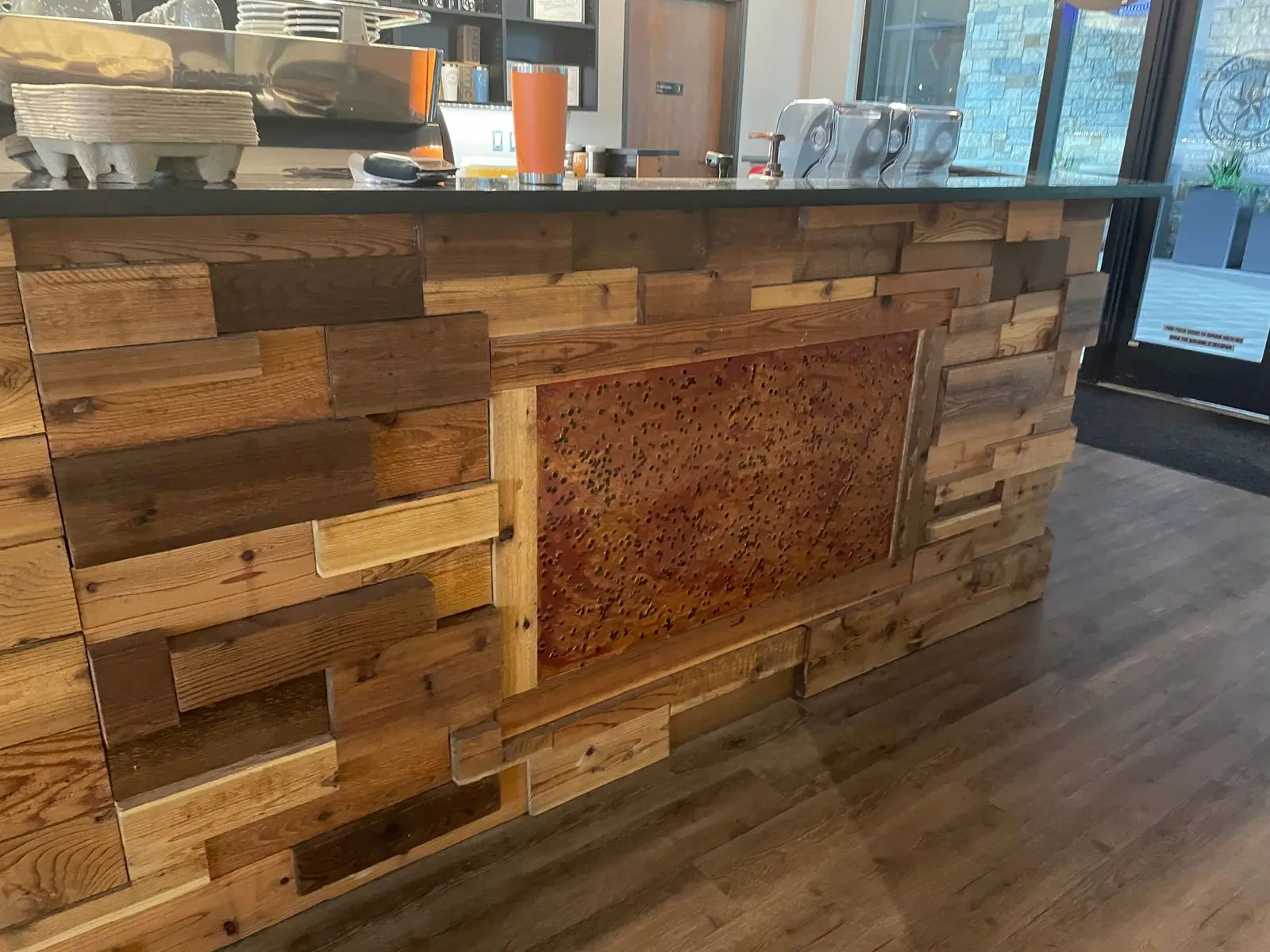 Feature wall made of mixed reclaimed wood planks