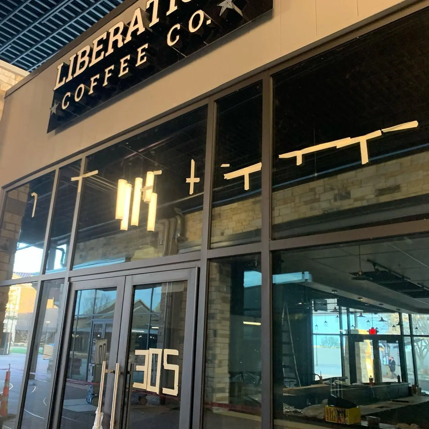 Coffee shop storefront with new signage